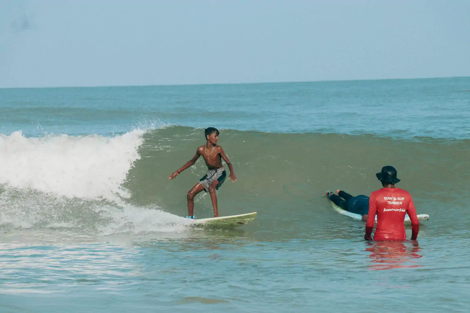 Young surfer supported through foundation athlete and youth development work