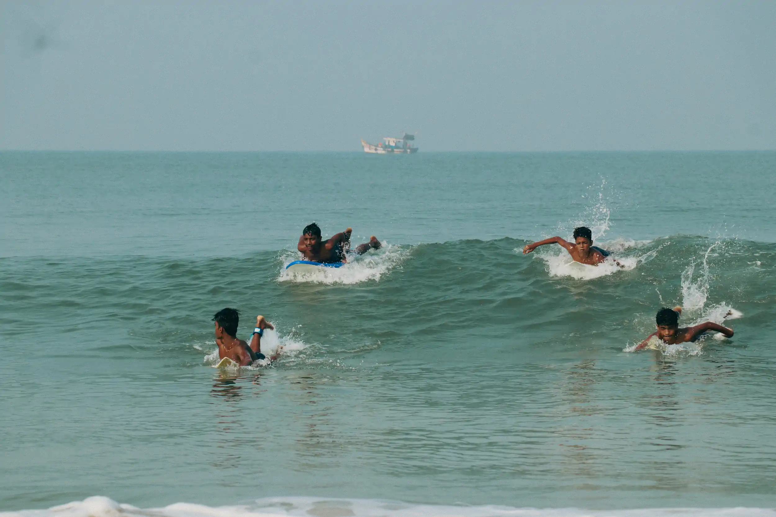 Surfer riding a wave during an ocean training session